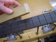Rounding the edges of the fretboard