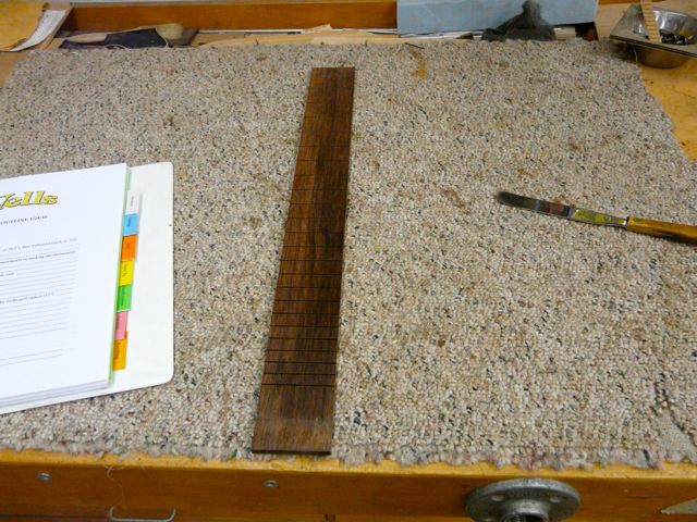The slotted fretboard