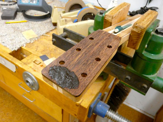 Cutting the pearl and inlaying the headstock