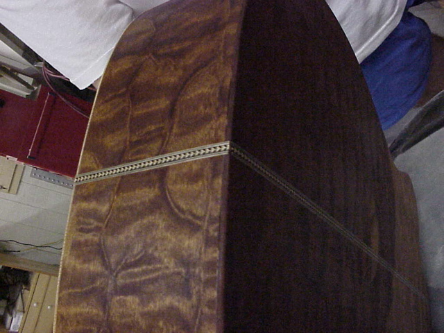 Inlaying the butt of the guitar