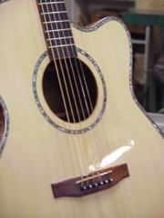 Soundhole of mahogany guitar